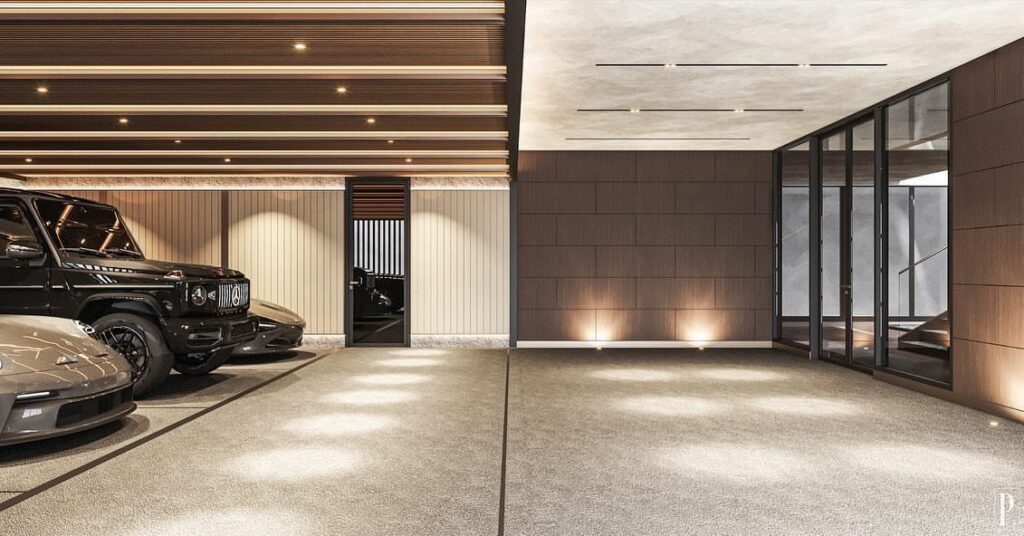 Luxury garage interior with wood-slat ceiling, polished floors, and parked high-end vehicles.